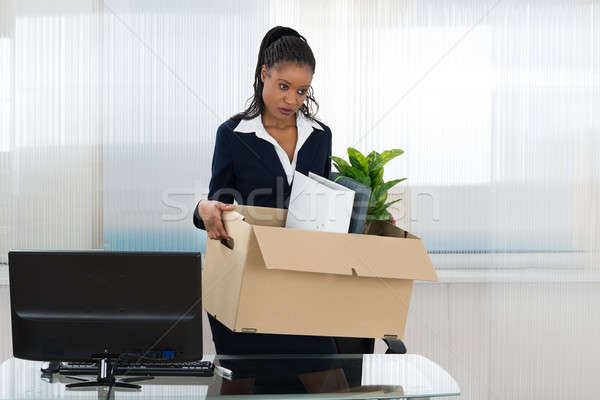 Businesswoman Carrying Box With Her Belongings Stock photo © AndreyPopov