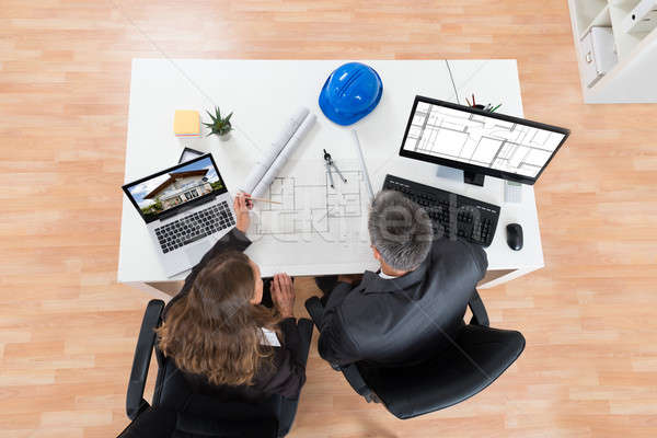 Stockfoto: Twee · bespreken · blauwdruk · kantoor