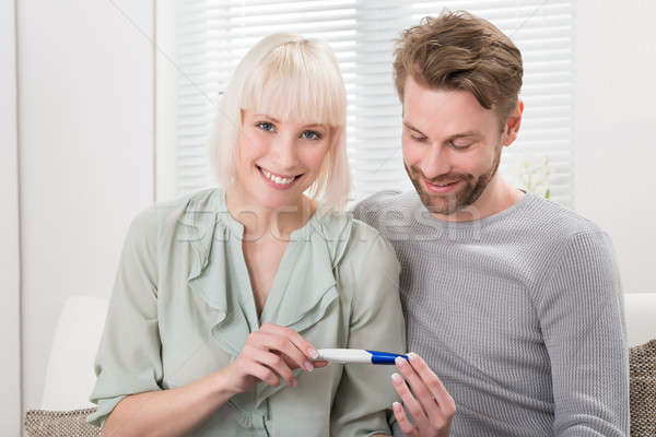 Couple Holding Pregnancy Tester Stock photo © AndreyPopov