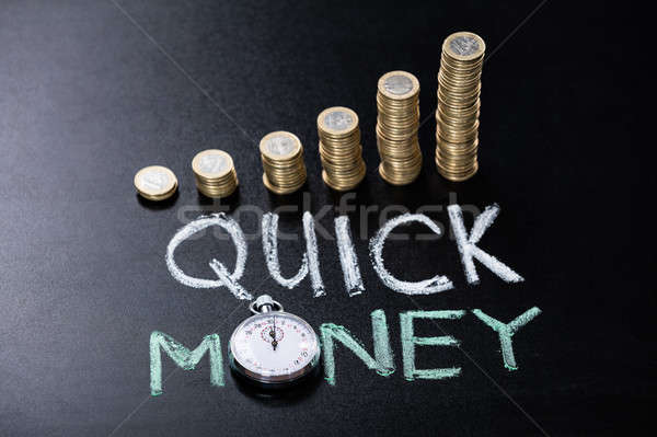 Quick Money Concept On Blackboard Stock photo © AndreyPopov