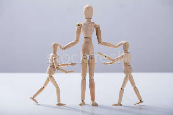 Wooden Dummy Caring For Child Dummy Stock photo © AndreyPopov
