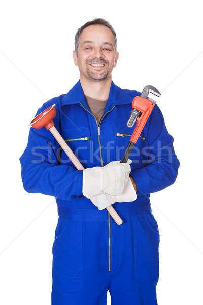 Happy Plumber Holding Plunger And Wrench Stock photo © AndreyPopov