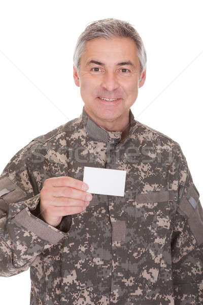 Mature Soldier Holding Blank Paper Stock photo © AndreyPopov