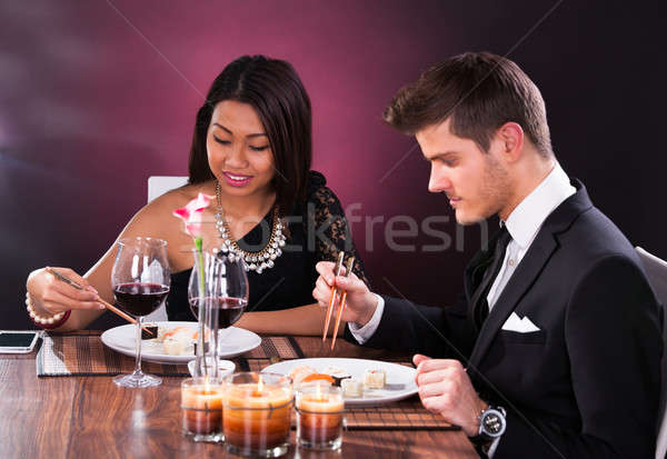 Couple Having Meal At Restaurant Stock photo © AndreyPopov