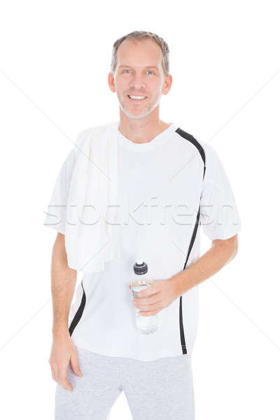 Szczęśliwy dojrzały mężczyzna manierka ręcznik biały Zdjęcia stock © AndreyPopov