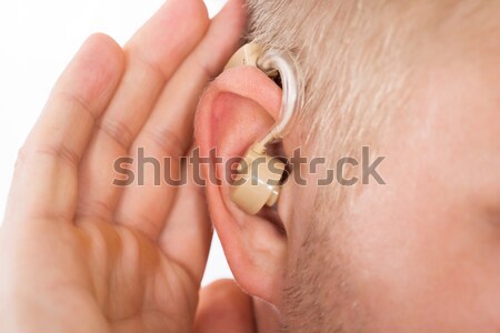 Ear With Hearing Aid Stock photo © AndreyPopov