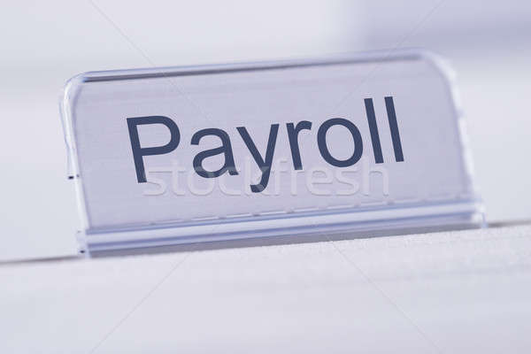 Payroll Tag On Table Stock photo © AndreyPopov