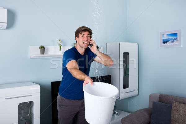Man Calling Plumber Stock photo © AndreyPopov