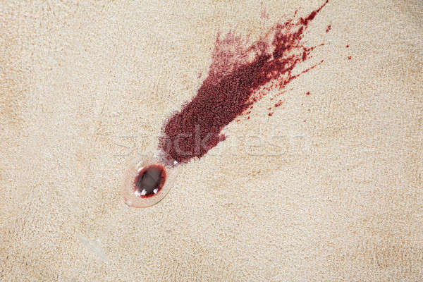 Red Wine Spilled From Glass On Carpet Stock photo © AndreyPopov