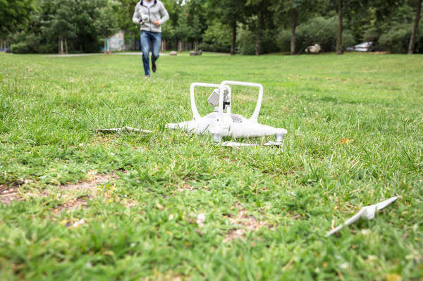 Quadrocopter Fallen On Grass Stock photo © AndreyPopov