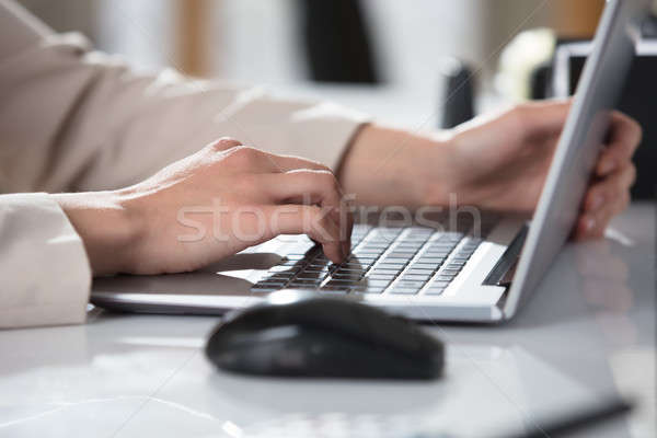 Hand's On Laptop Keypad Stock photo © AndreyPopov