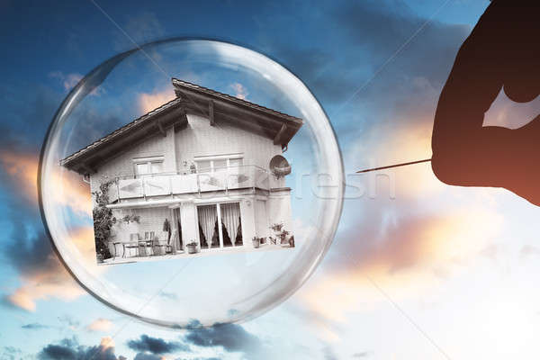 Human Hand Poking Bubble With Needle Stock photo © AndreyPopov