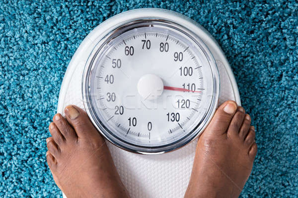 Human Foot On Weighing Scale Stock photo © AndreyPopov