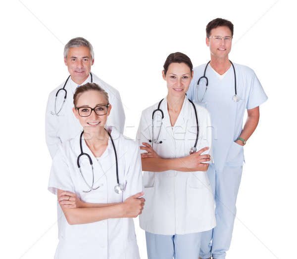 Ärzte Krankenschwestern Zeile lächelnd medizinischen Stock foto © AndreyPopov