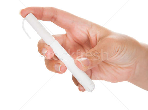 Close-up of hand holding tampon Stock photo © AndreyPopov