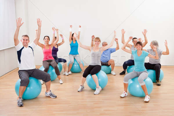 Büyük bir grup insanlar pilates spor salonu oturma Stok fotoğraf © AndreyPopov