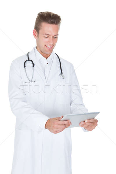 Portrait of friendly doctor with digital tablet Stock photo © AndreyPopov