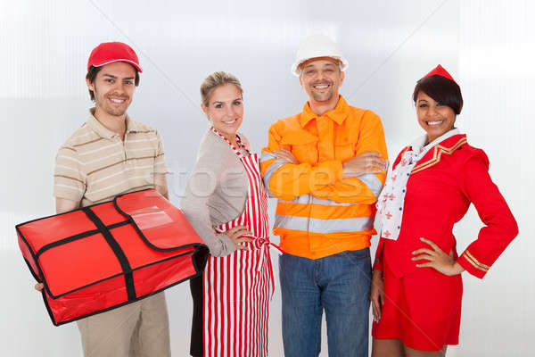 Diverse group of smiling workers Stock photo © AndreyPopov