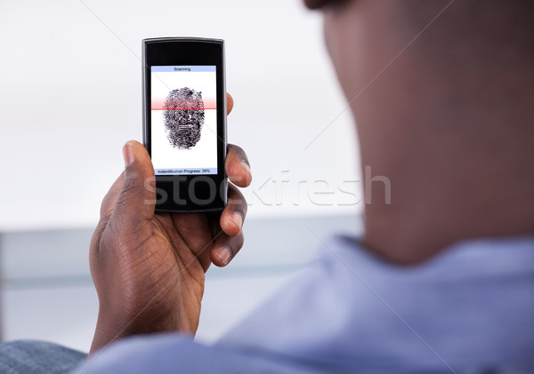 Mobile Phone Authentication Using Fingerprint Scan Stock photo © AndreyPopov
