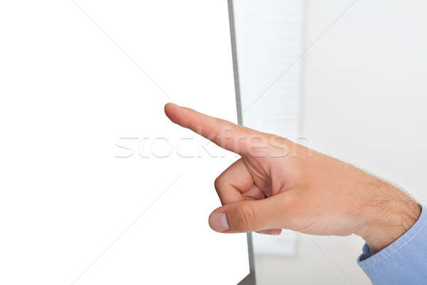 Businessman Touching Blank Computer Screen Stock photo © AndreyPopov