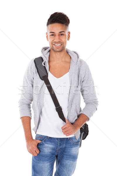 Handsome Student Carrying Shoulder Bag Stock photo © AndreyPopov
