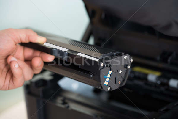 Businessman Fixing Cartridge In Photocopy Machine Stock photo © AndreyPopov