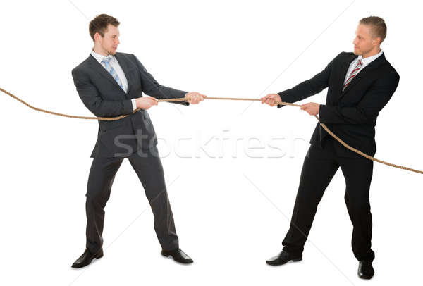 Two Businessman Pulling Rope Stock photo © AndreyPopov