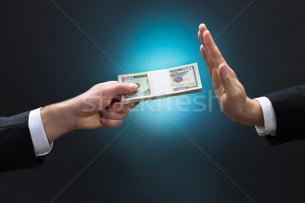 Businessman Refusing To Take Bribe From Partner Stock photo © AndreyPopov