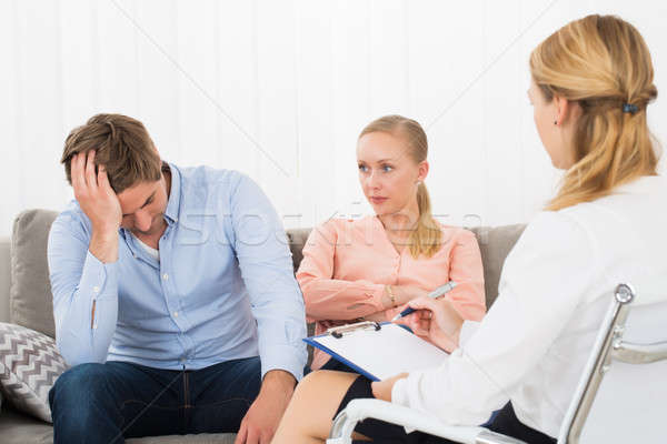 Psychologist Sitting With Frustrated Couple Stock photo © AndreyPopov