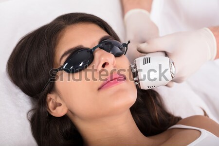 Woman Receiving Laser Hair Removal Treatment On Her Face Stock photo © AndreyPopov