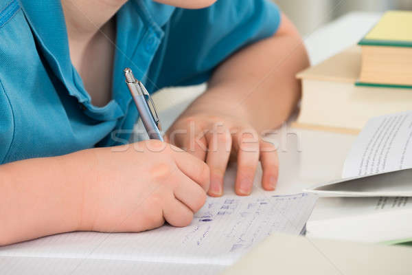 Boy Studying With Book Stock photo © AndreyPopov