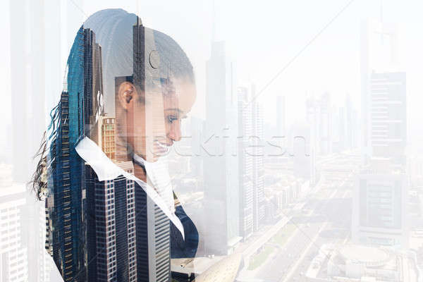 Jóvenes mujer de negocios sonriendo ciudad compuesto digital imagen Foto stock © AndreyPopov