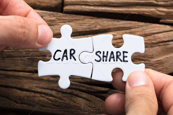 Hands Connecting Car Share Jigsaw Pieces Stock photo © AndreyPopov
