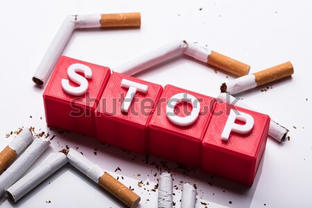 Cigarette And Wooden Blocks Showing Stop Word Stock photo © AndreyPopov