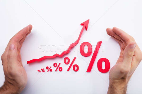 Human Hand Protecting Percentage Symbol And Arrow Sign Stock photo © AndreyPopov