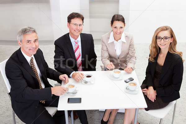 Business executives enjoying coffee Stock photo © AndreyPopov