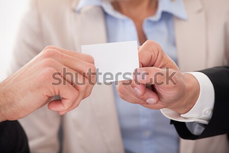 Stock photo: Two Businessman Exchanging Visiting Card