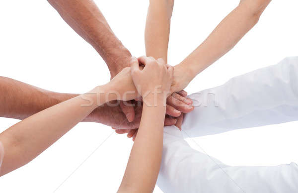 Group Of Doctors Stacking Hands Together Stock photo © AndreyPopov