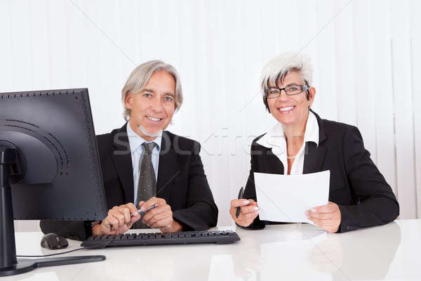 Senior partners at a business meeting Stock photo © AndreyPopov