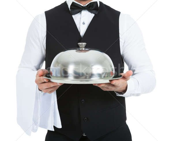 Waiter Holding Domed Tray Stock photo © AndreyPopov
