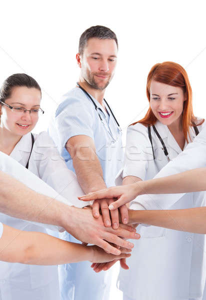 Medical team stacking hands Stock photo © AndreyPopov