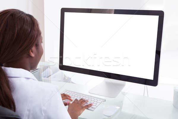 Dentist Using Desktop PC Stock photo © AndreyPopov