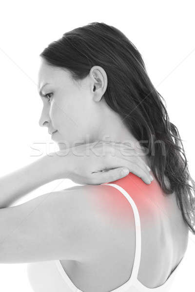 Nő szenvedés vállfájás fiatal nő fájdalom váll Stock fotó © AndreyPopov