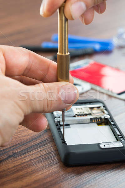 Technician Hand Fixing Cellphone Stock photo © AndreyPopov