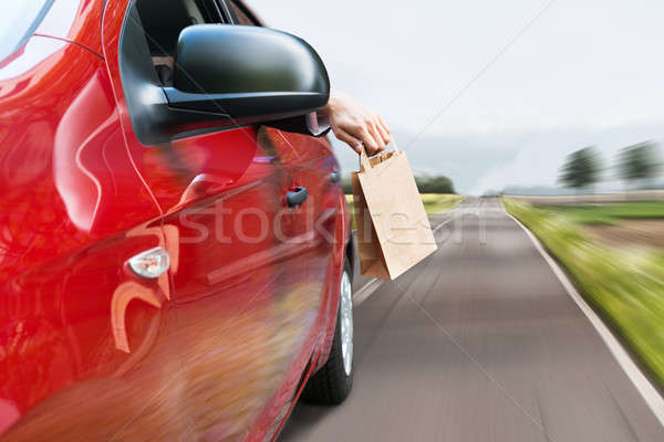 Person Throwing Trash Out Of Car Window Stock photo © AndreyPopov