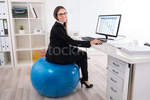 女性実業家 座って ピラティス ボール 小さな ストックフォト © AndreyPopov