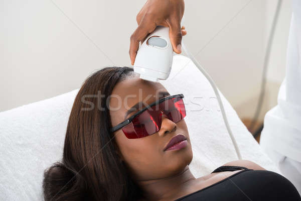 Therapist Giving Laser Epilation Treatment To Woman Stock photo © AndreyPopov