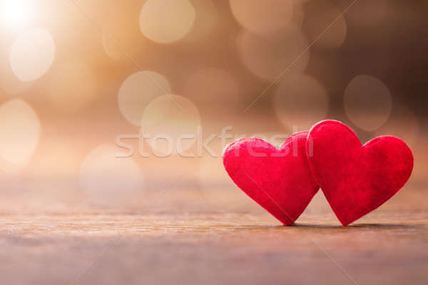 Two Red Heart On Wooden Textured Stock photo © AndreyPopov