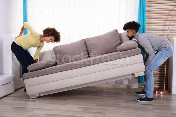 Vrouw sofa echtgenoot woonkamer home Stockfoto © AndreyPopov