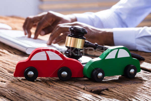 Car With Mallet And Gavel On The Businessman's Desk Stock photo © AndreyPopov